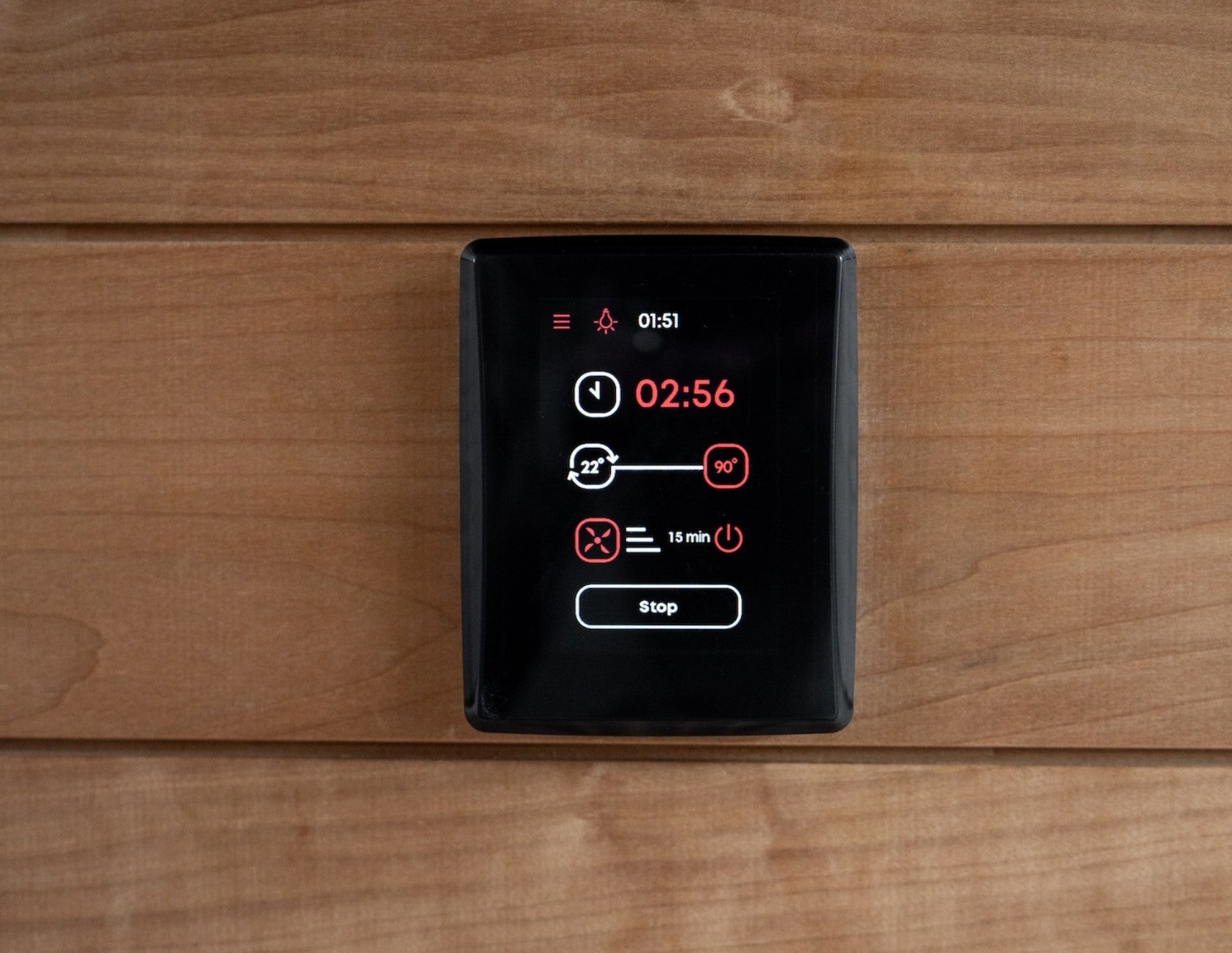 Saunum AirIQ WiFi panel in a sauna, session running