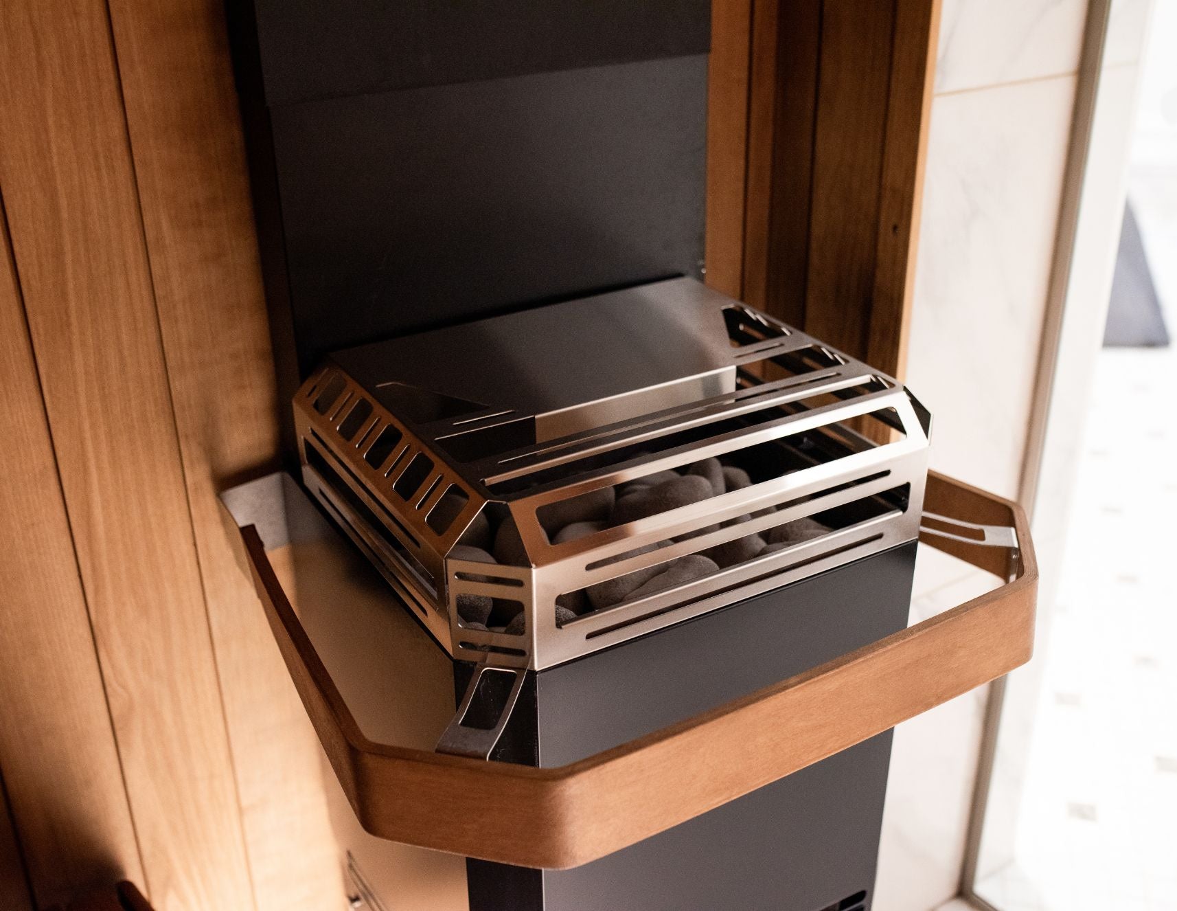 Saunum Air L climate-equalizer heater in a cabin