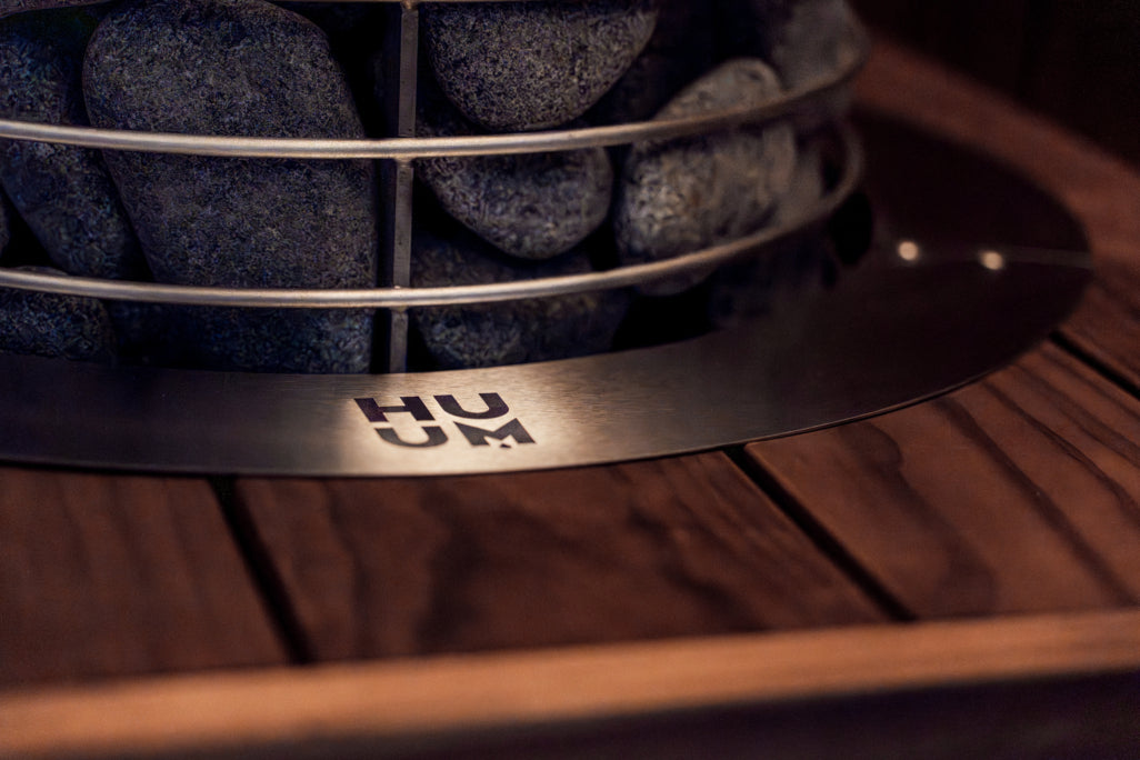 HUUM HIVE Mini in a sauna with safety railing